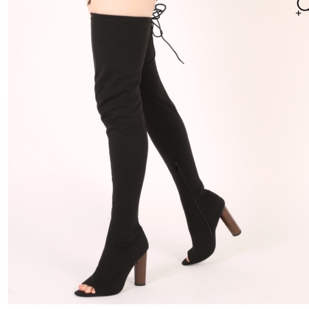 Knee high heeled boots